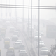 Traffic drives through heavy smog in Delhi on Nov. 10, 2017.